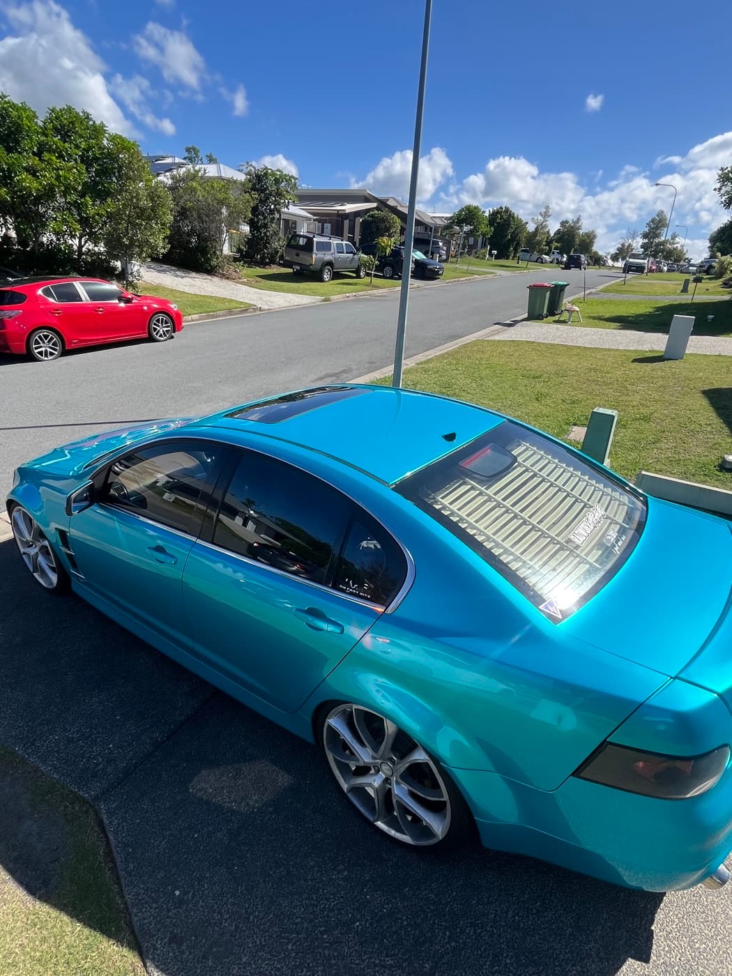 Turquoise Holden Commodore full vinyl wrap, side profile