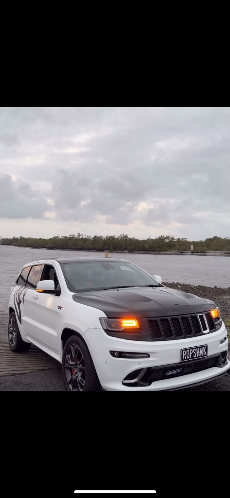 White Jeep Grand Cherokee SRT with satin black bonnet wrap